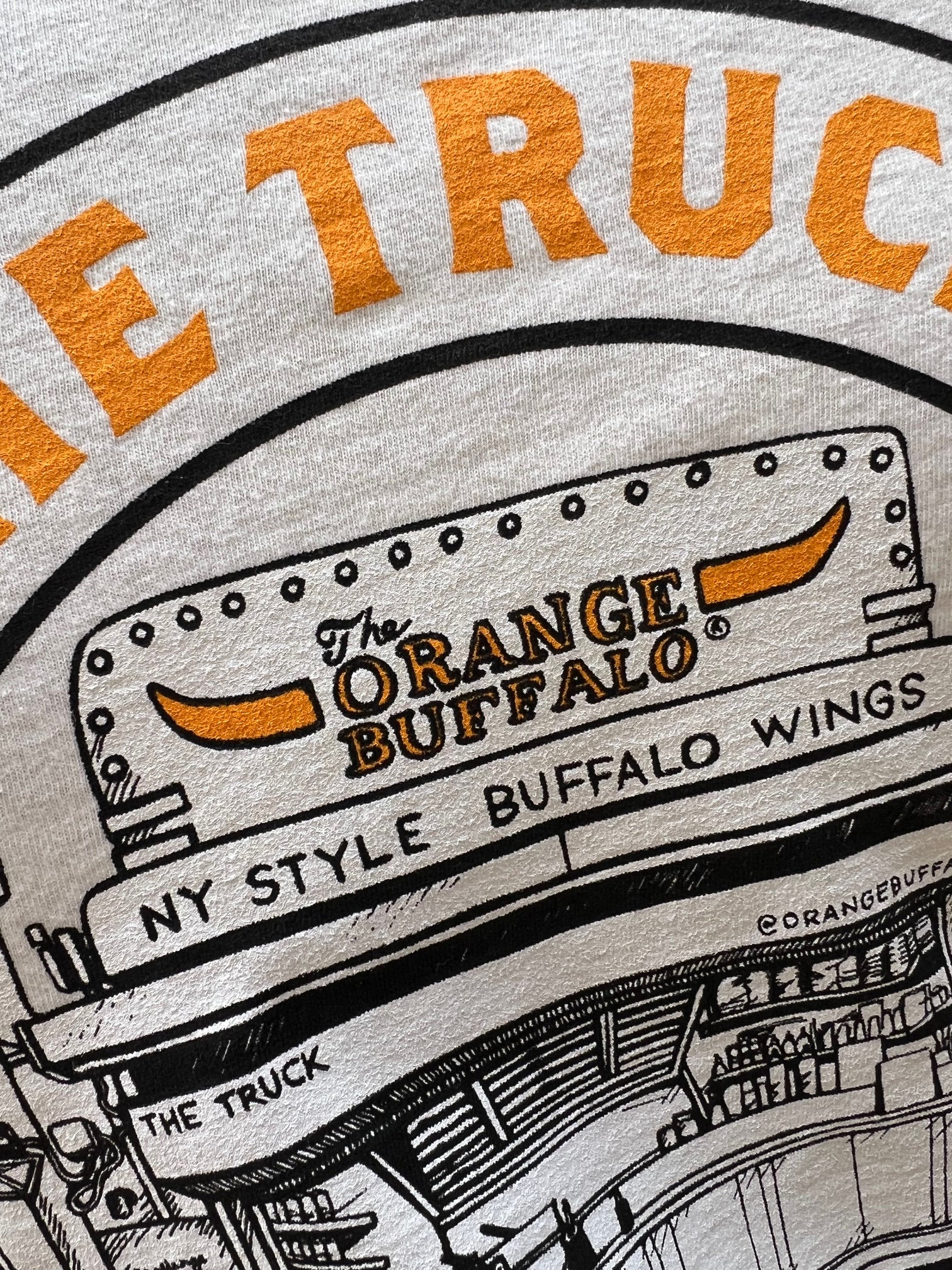 NEW TRUCK T-SHIRT BY JO PEEL IN OFF WHITE
